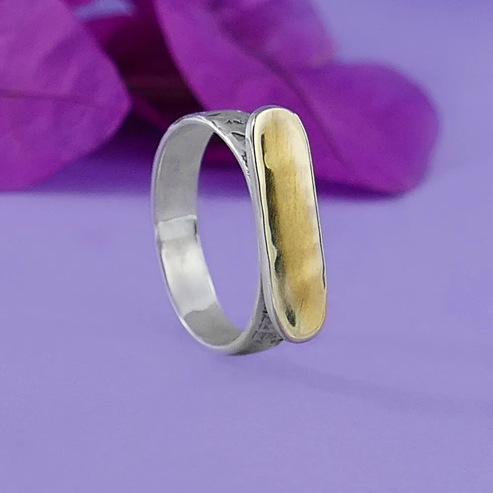 Chic Contrast: Artisan Two-Tone Stunner Ring