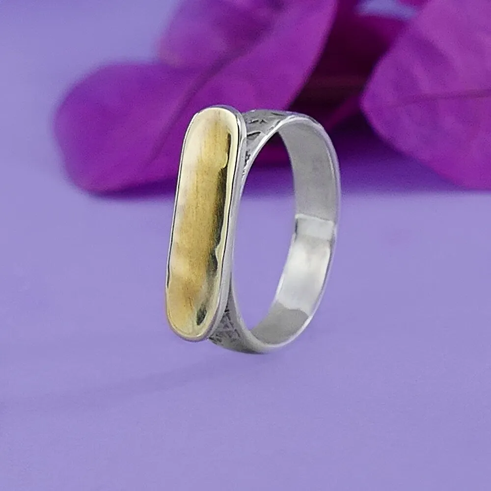 Chic Contrast: Artisan Two-Tone Stunner Ring